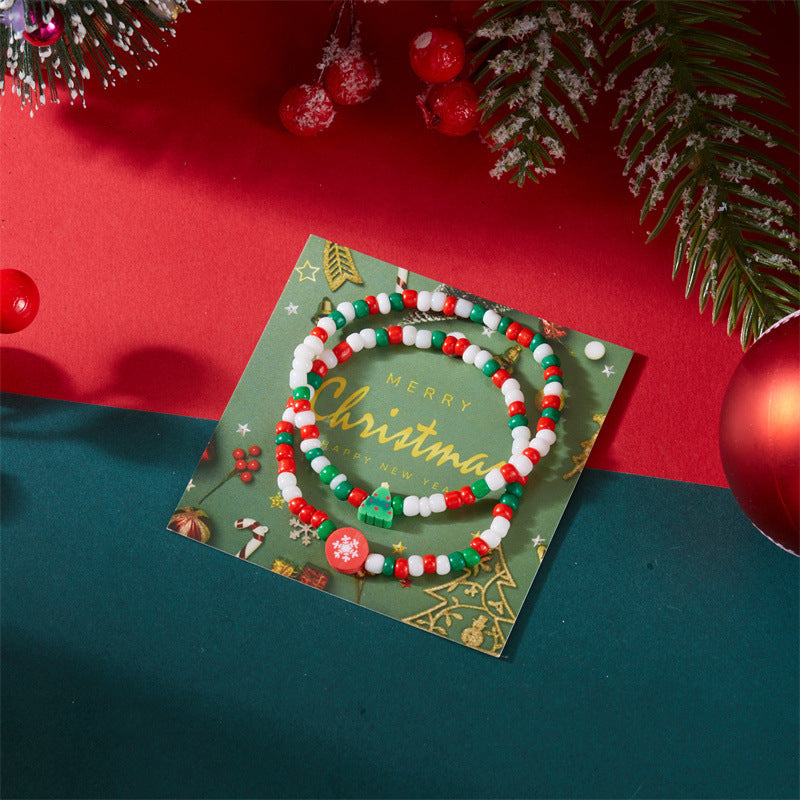 Set di bracciali natalizi fatti a mano in argilla polimerica con ciondoli a fiocco di neve e Babbo Natale per coppie