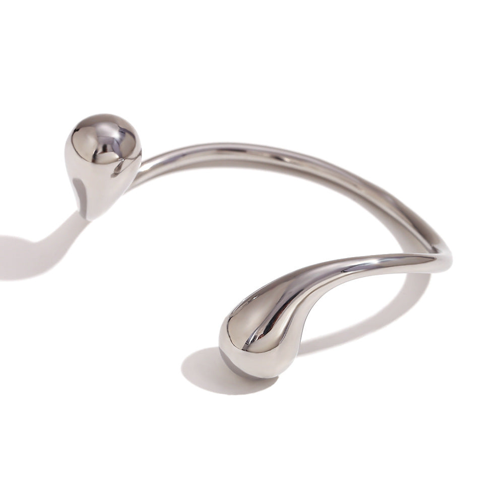 Bracciale rigido aperto minimalista da donna in acciaio inossidabile placcato oro 18 carati con doppia goccia irregolare