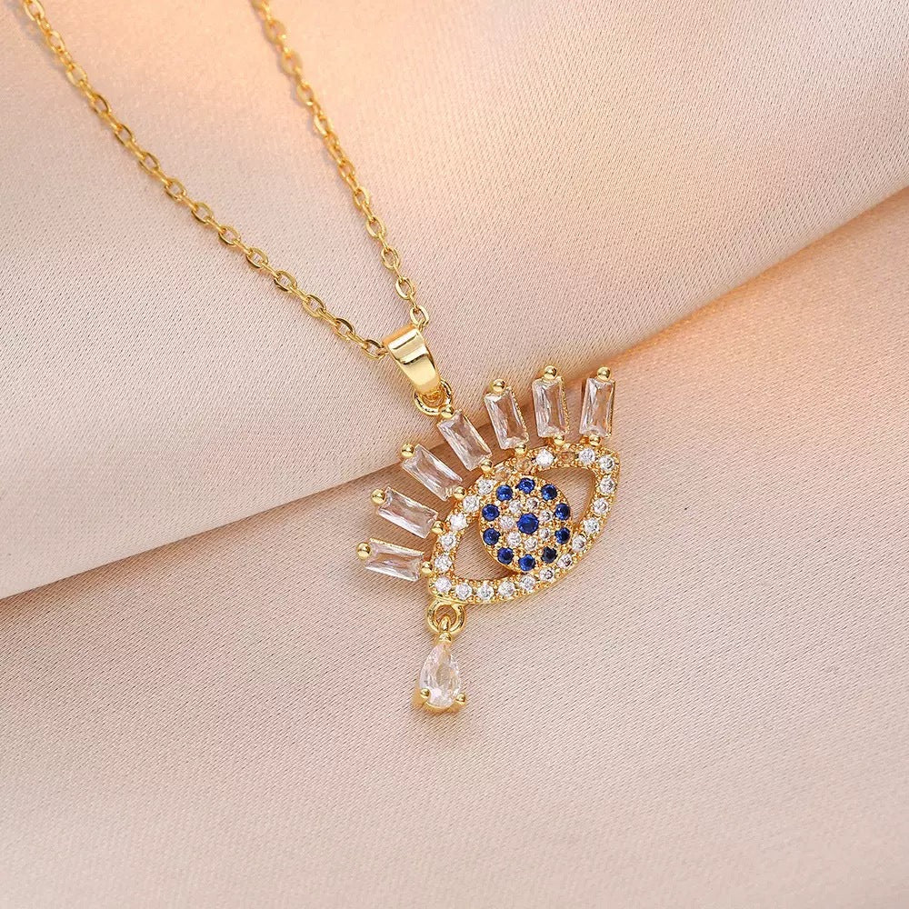 Collana con pendente minimalist con Occhio di Allah in acciaio al titanio con rame placcato oro 18K e zirconi colorati