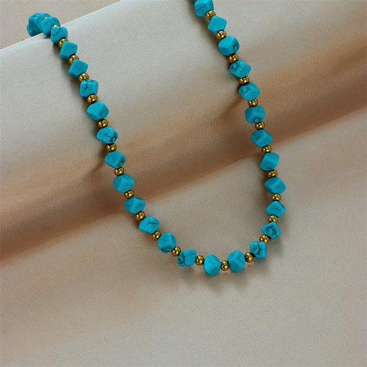 Collana da donna vintage con perline turchesi geometriche e intrecciate in acciaio al titanio placcato