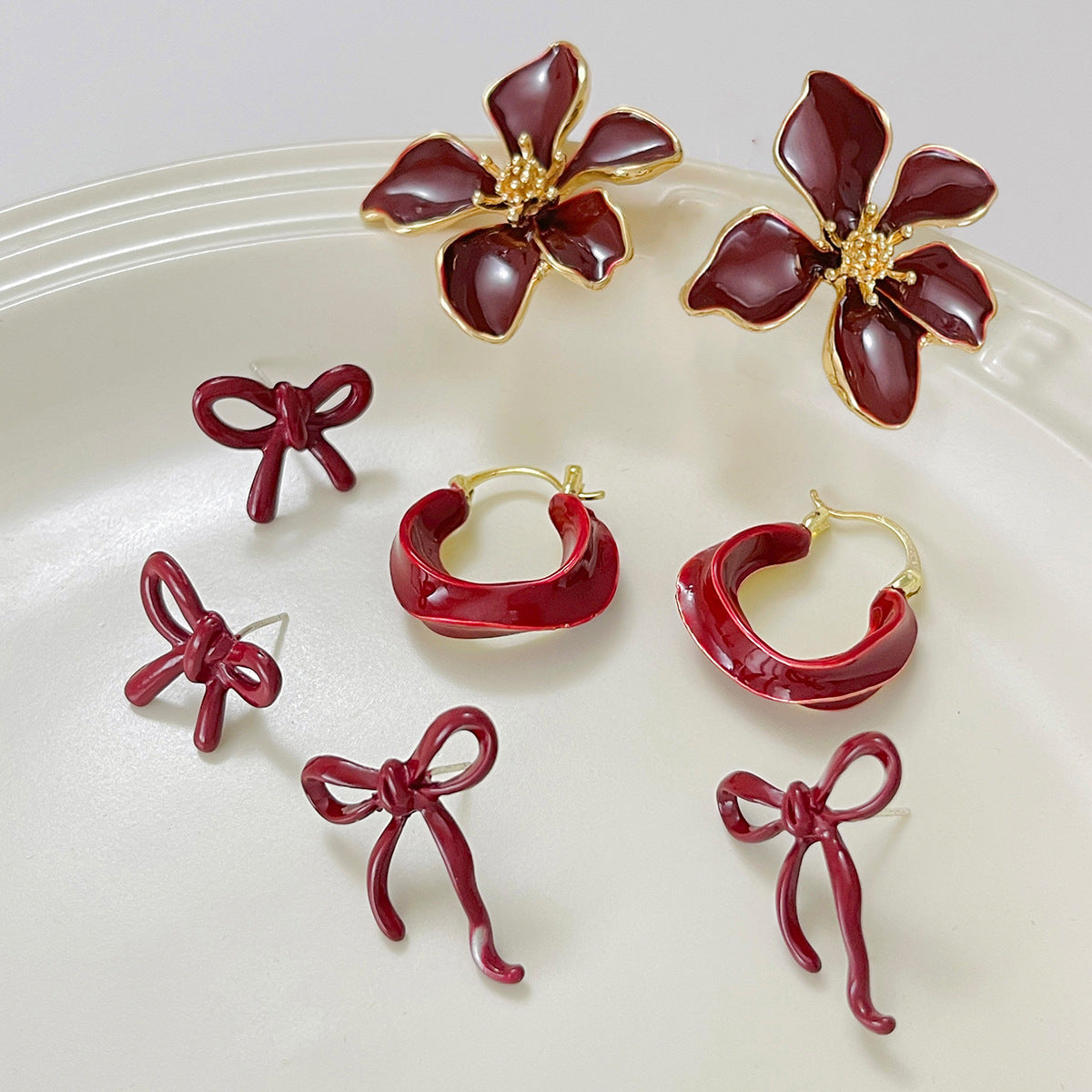 Minimalist Floral Bow Earrings for Women with Enamel Finish in Alloy Metal