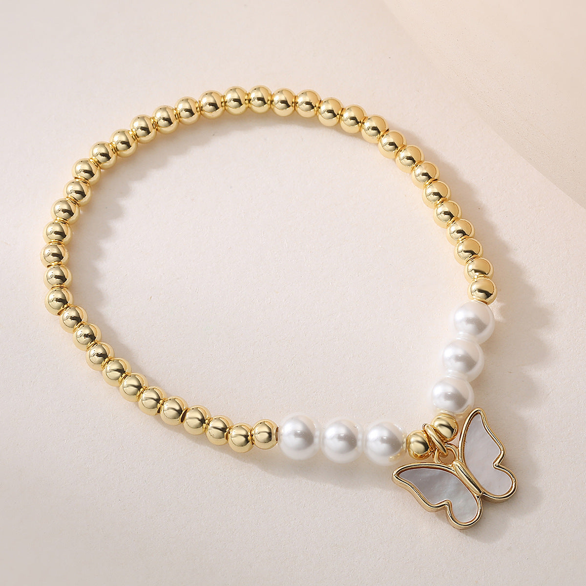 Elegant 18K Gold Plated Brass Butterfly Heart Geometric Pendant with Cubic Zirconia and Pearl Bracelet for Women