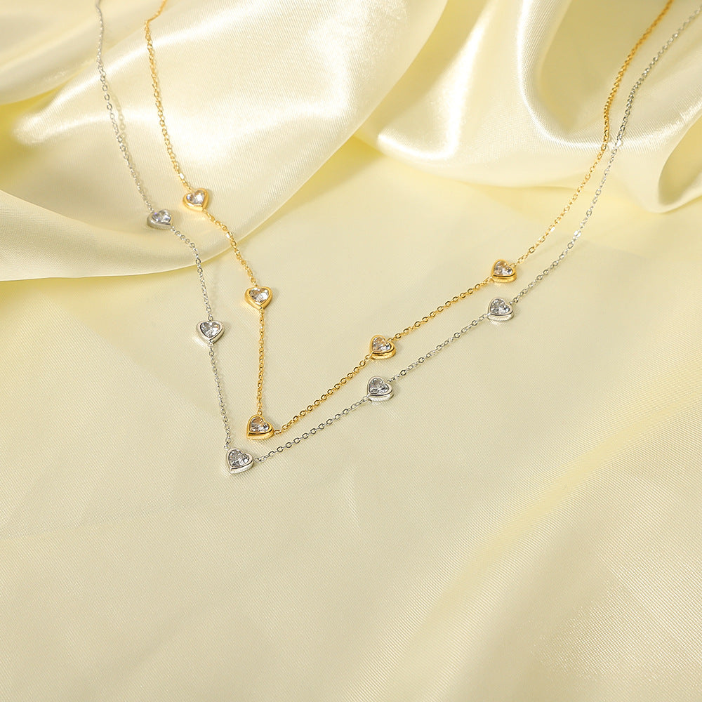 Collana da donna in acciaio inossidabile a forma di cuore stile INS con ciondolo in acciaio al titanio placcato oro 18 carati e intarsio in zirconi