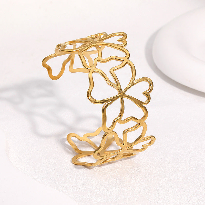 Bracciale a Polsino Aperto Minimalista in Acciaio Inossidabile Placcato Oro 18K con Design Floreale Intagliato