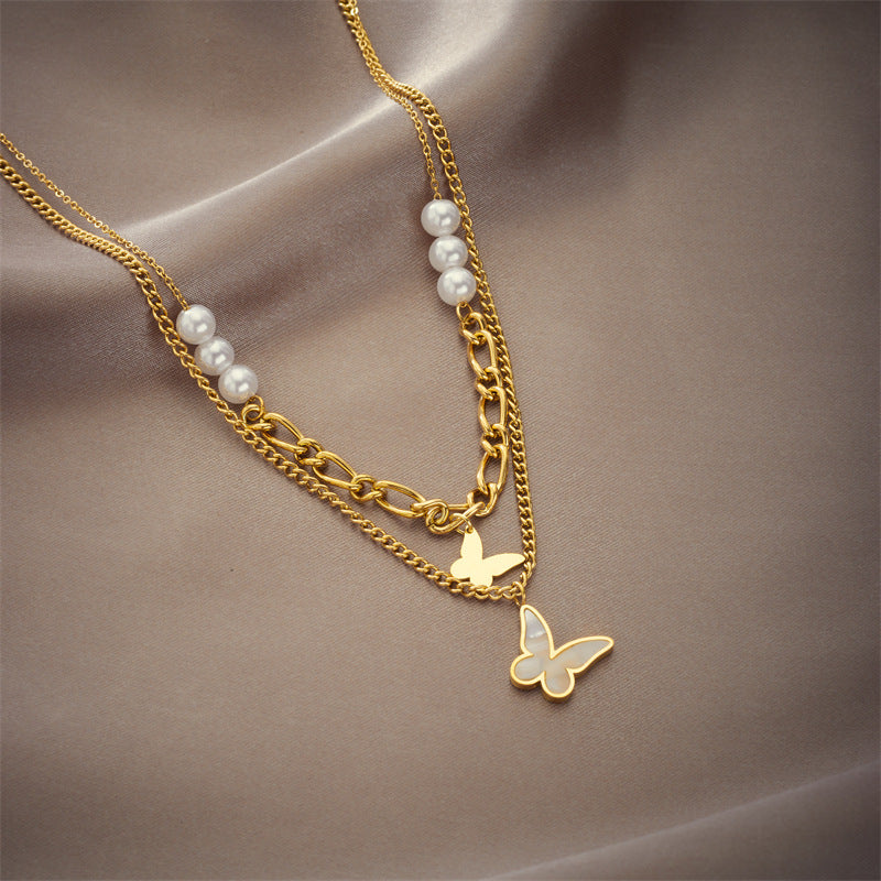 Collana da donna in acciaio al titanio con ciondolo a farfalla con perline irregolari a doppio strato in stile vintage
