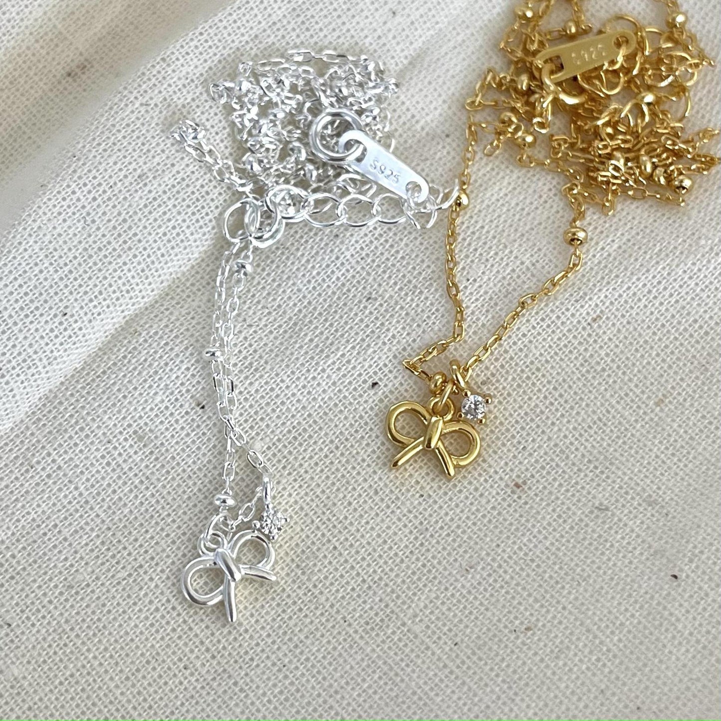 Minimalist Bowknot Pendant Necklace in 925 Sterling Silver with Cubic Zirconia Accents on Beaded Chain