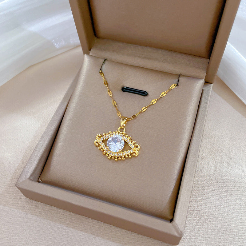 Collana da donna con ciondolo a occhio e ciglia geometrico in acciaio al titanio di lusso, con intarsi in strass, catena regolabile in acciaio al titanio
