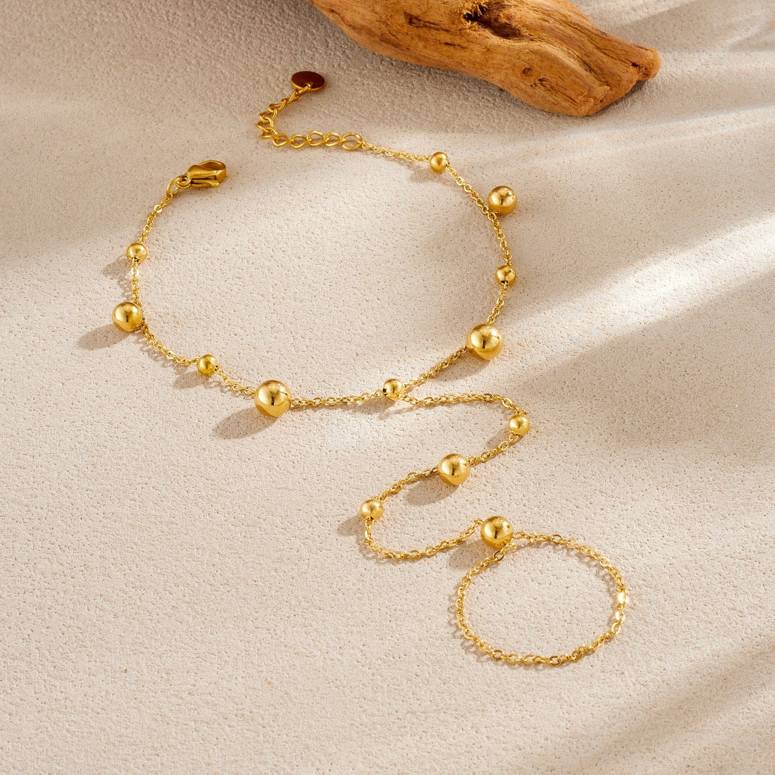 Sweet Gold Plated Stainless Steel Geometric Round Bead Long Tassel Hand Chain for Women