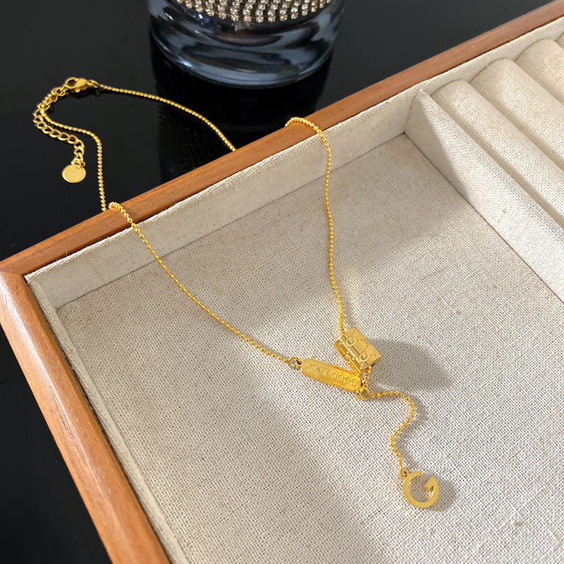 Plated Titanium Steel Letter G Tassel Necklace