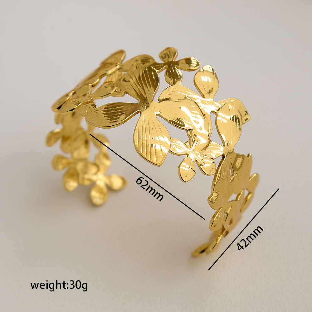 Bracciale Minimalista Ispirato alla Francia in Acciaio Inossidabile con Trafori a Motivi Floreali di Foglie e Girasoli