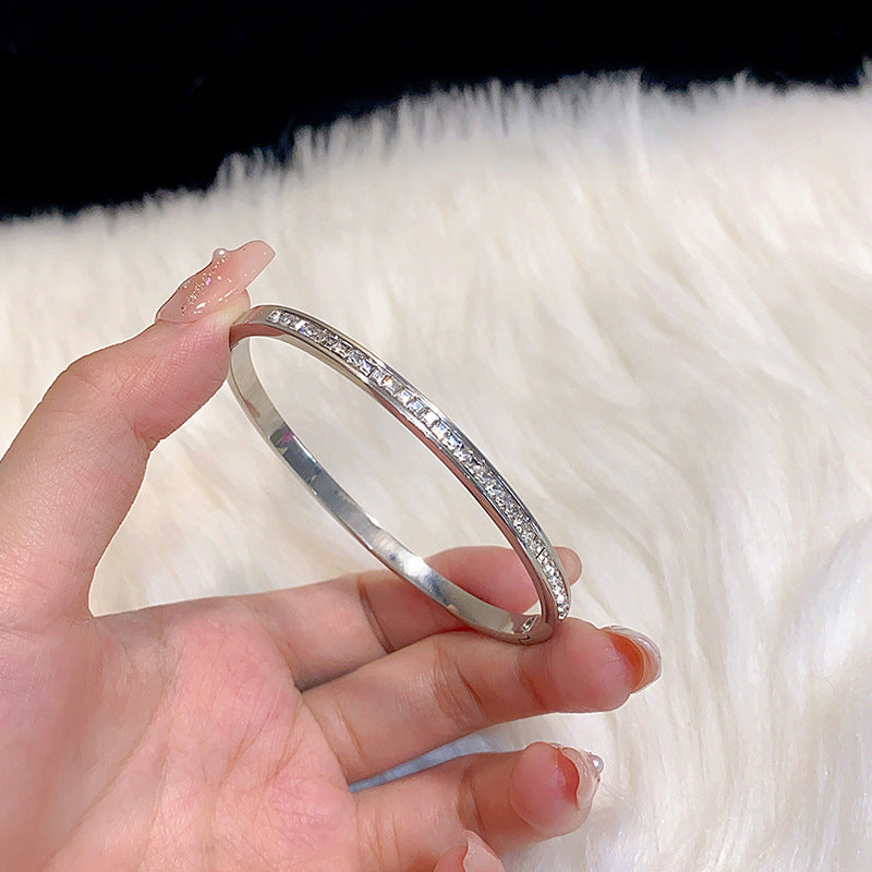 Minimalist Elliptical Titanium Steel Bracelet with Plating Finish for Women Elegant Lightweight Luxury Bangle