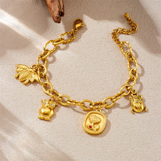 Bracciale alla moda con ciondoli a forma di gufo, ape, coccinella e rosa in acciaio inossidabile placcato oro 18K