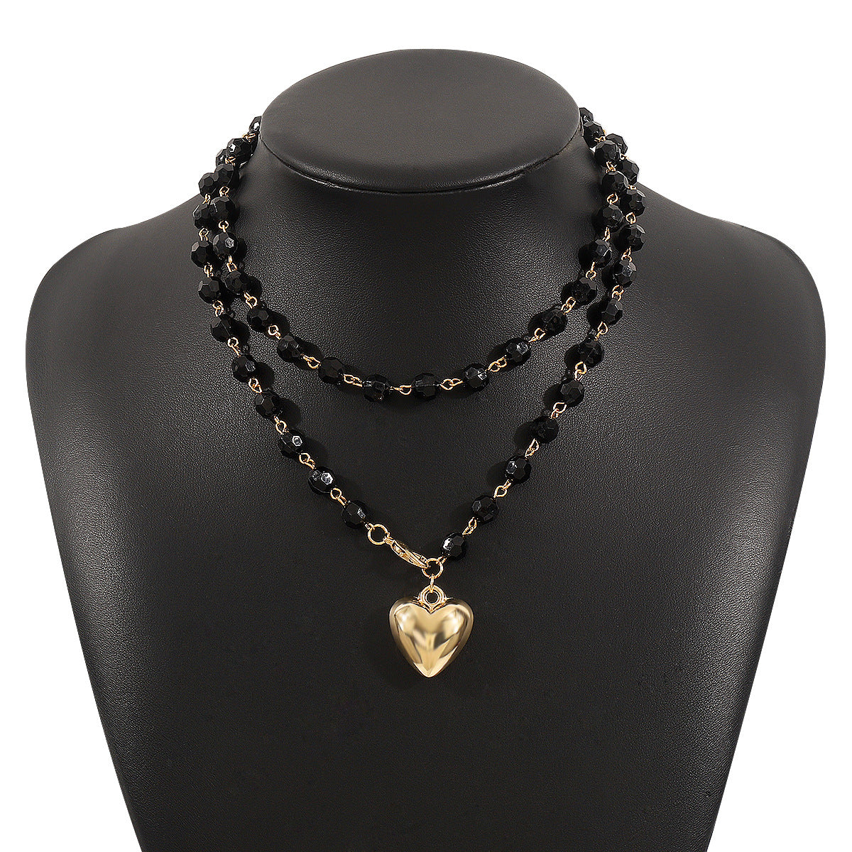 Collar de doble capa minimalista con colgante de corazón, acentos de perlas simuladas y acabado chapado en oro para mujer