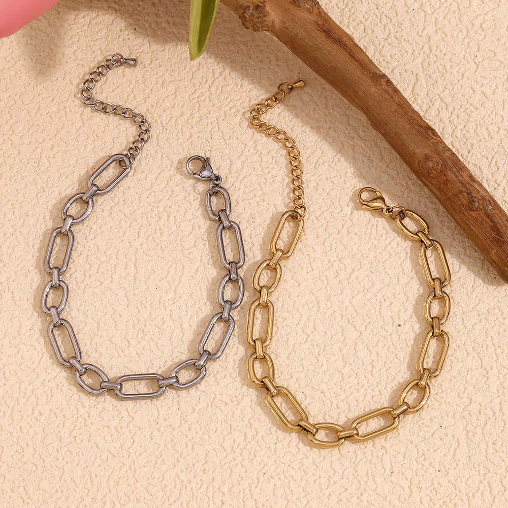 Tobillera minimalista geométrica de acero inoxidable con detalles de imperdibles chapados en oro de 14 quilates para mujer