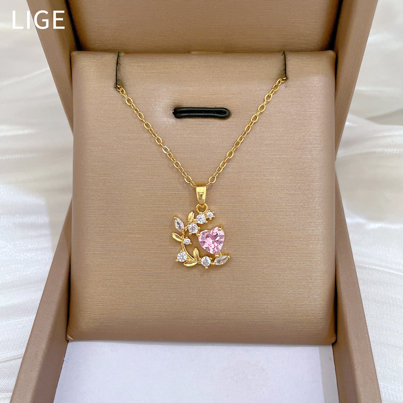 Collana con catena a collare elegante di lusso in acciaio al titanio con zircone a foglia di cuore per unisex