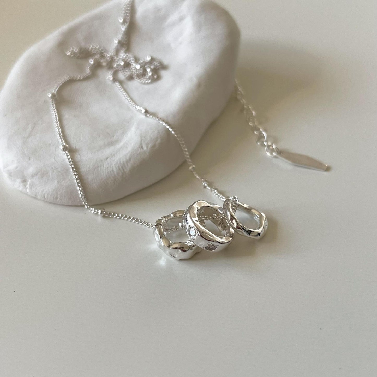 Elegant French-Style Geometric Asymmetrical Zircon Pendant Necklace in 925 Sterling Silver with Water Texture and Natural Pattern