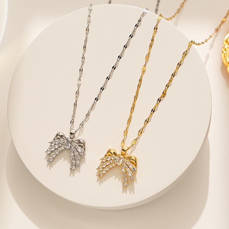Collar minimalista con lazo para mujer, colgante de acero titanio con incrustaciones de diamantes de imitación y cadena ondulada