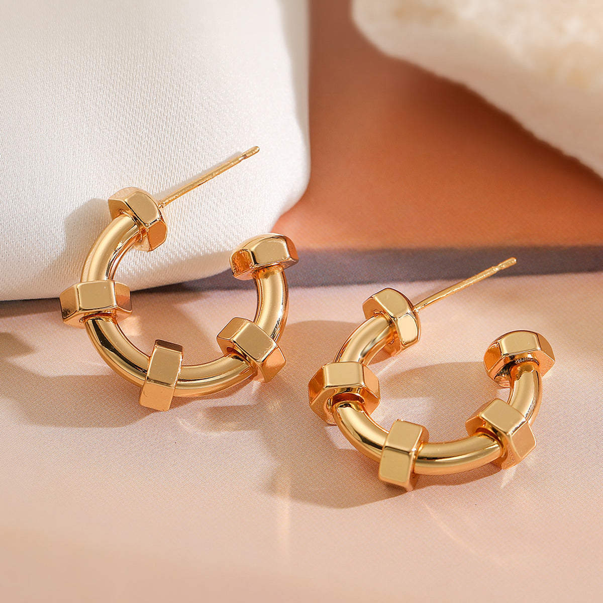 Punk Style Geometric C-Shaped Earrings for Women in Copper with 18K Gold Plating