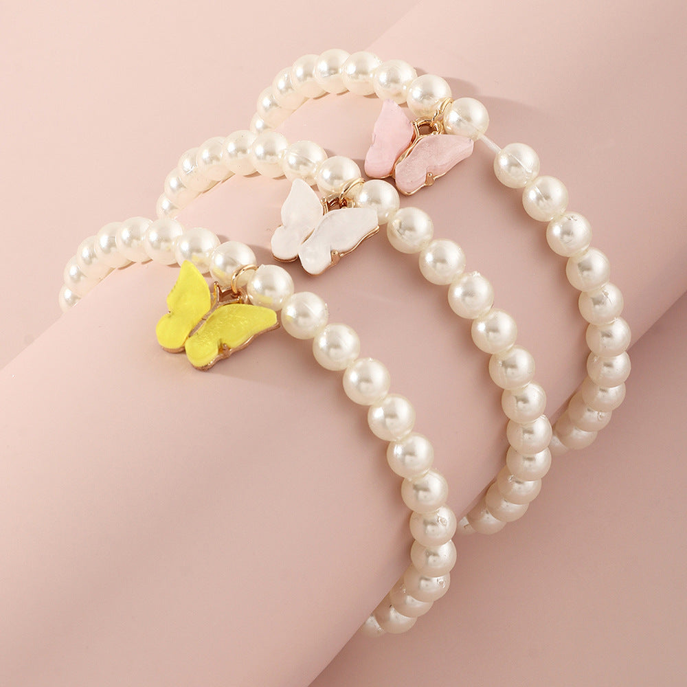 Braccialetto con perle e ciondolo a forma di farfalla in stile cartone animato per bambine con design geometrico, gioielli fatti a mano per bambini