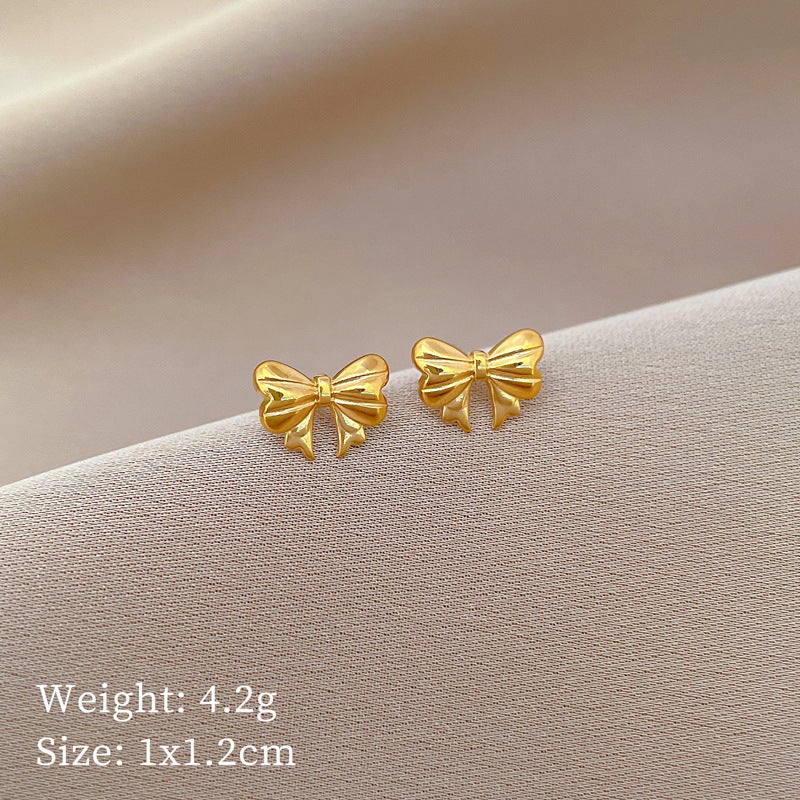 Minimalist Bowknot-Shaped Titanium Steel Stud Earrings with Plated Finish for Women