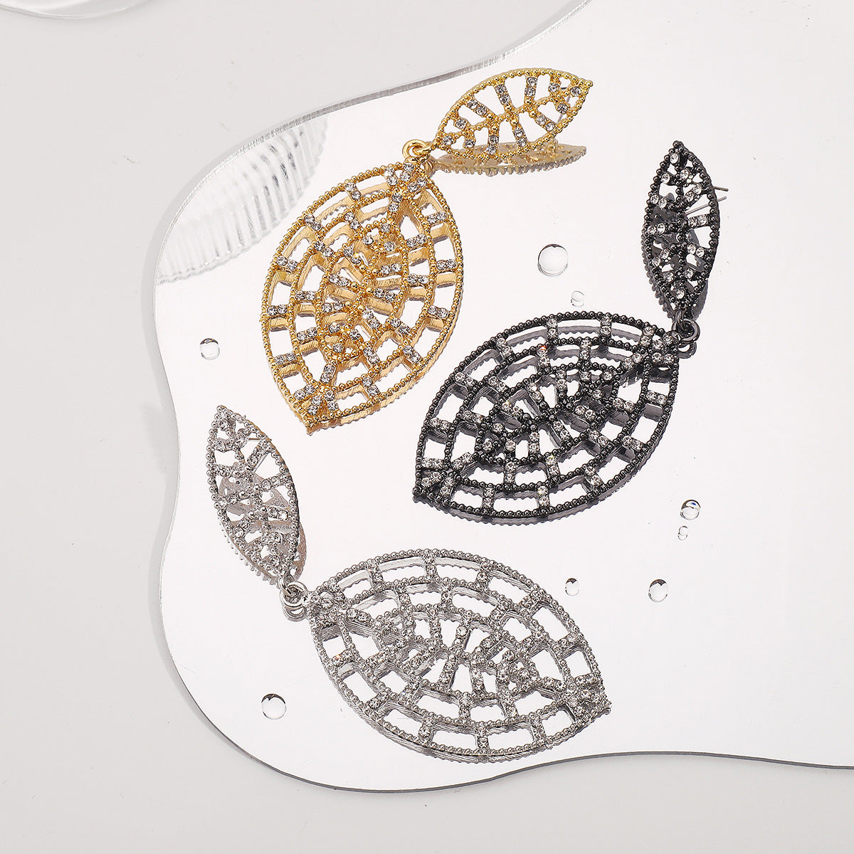 Elegant Leaf-Shaped Alloy Earrings with Rhinestone Inlay, Electroplated Finish, Geometric Design, Fashionable Women's Lightweight Luxury Ear Jewelry