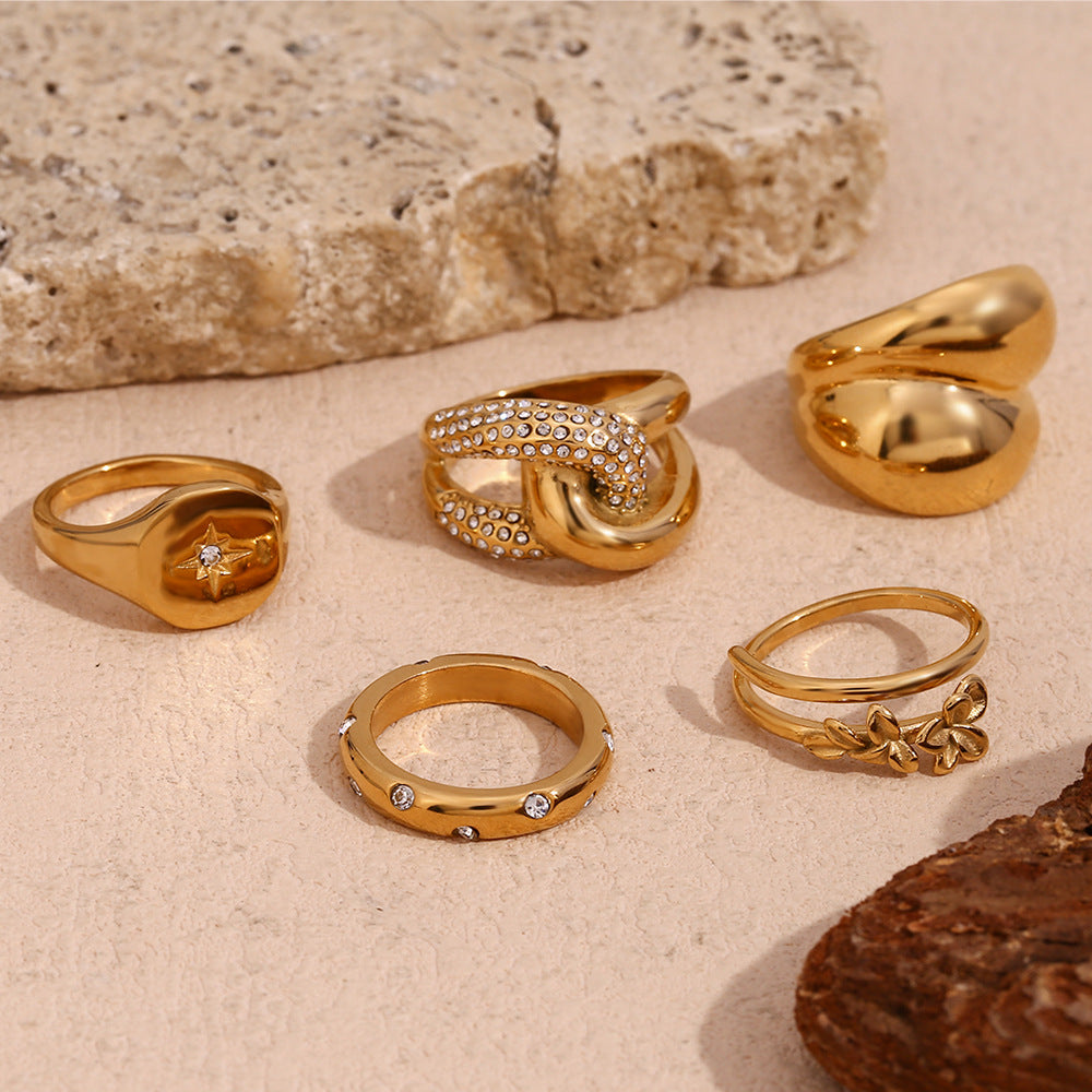 Anello in acciaio inossidabile da donna con fiore minimalista e forma geometrica placcato in oro 18K