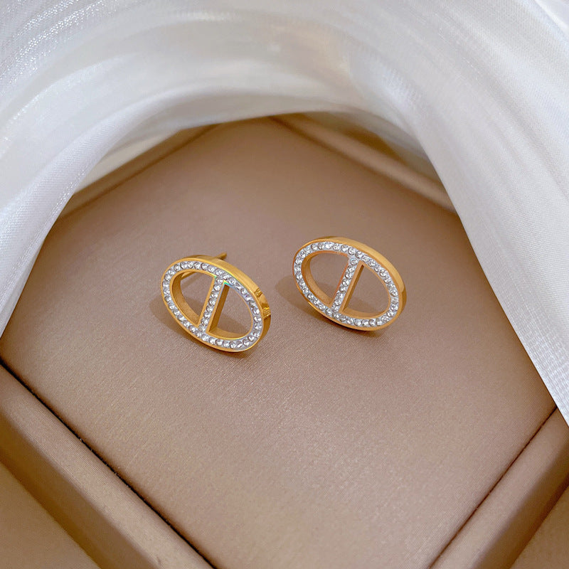 Pendientes de tuerca minimalistas geométricos de acero titanio con incrustaciones de diamantes de imitación para mujer, joyería de oreja de moda en tonos fríos para fiestas