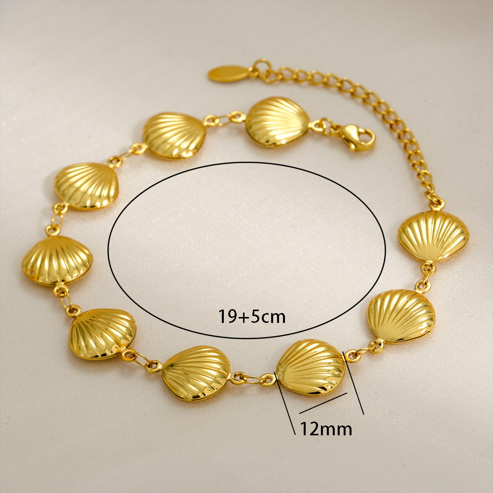 Bracciale a goccia in acciaio inossidabile cavo con conchiglia hip hop, forma a cuore geometrica a goccia d'acqua e accento a croce placcato oro