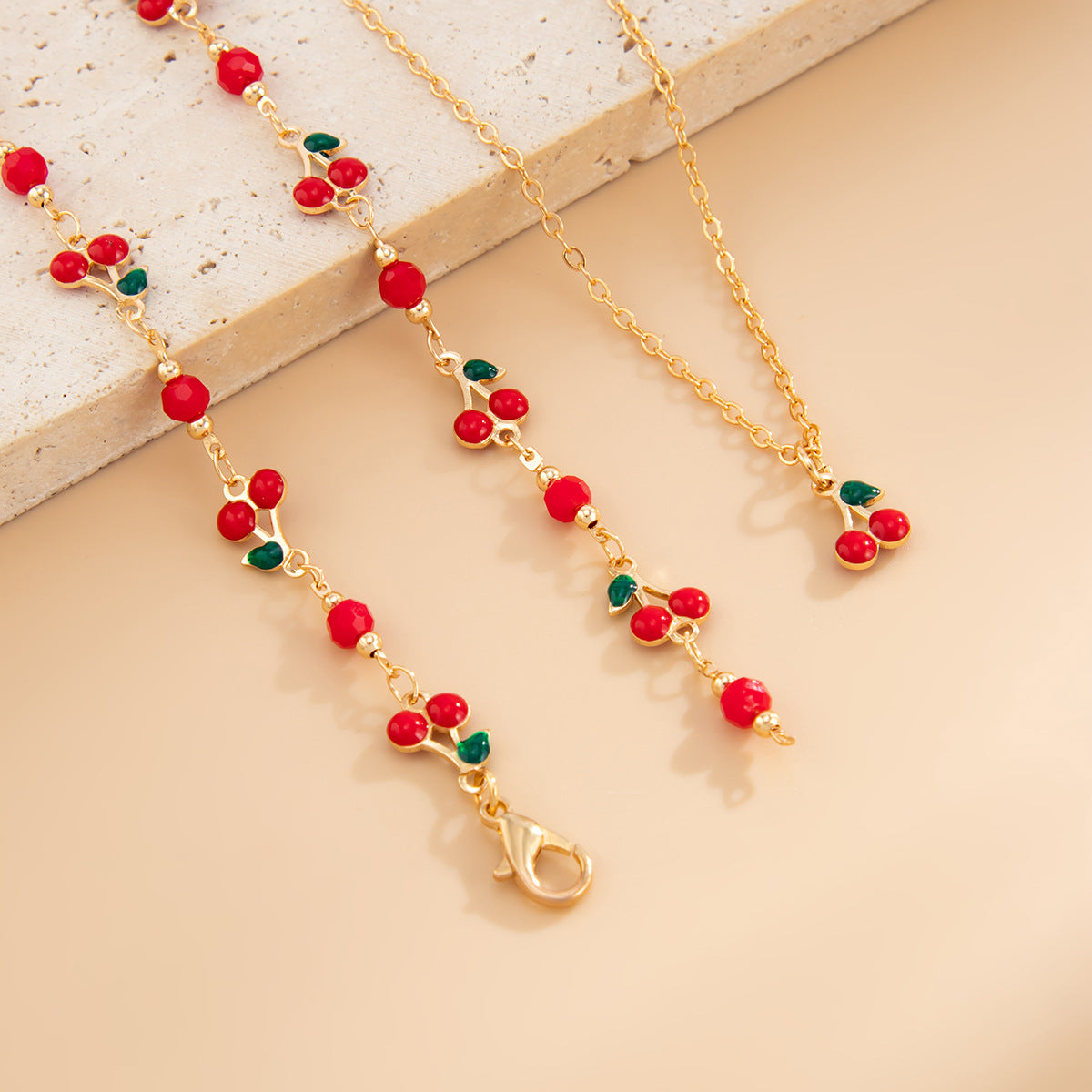 Cherry-Shaped Fruit Pendant Necklace for Women with Y-Shape Design, Metal Construction, Enamel Finish, Long Tassel Drop, Minimalist and Edgy Style