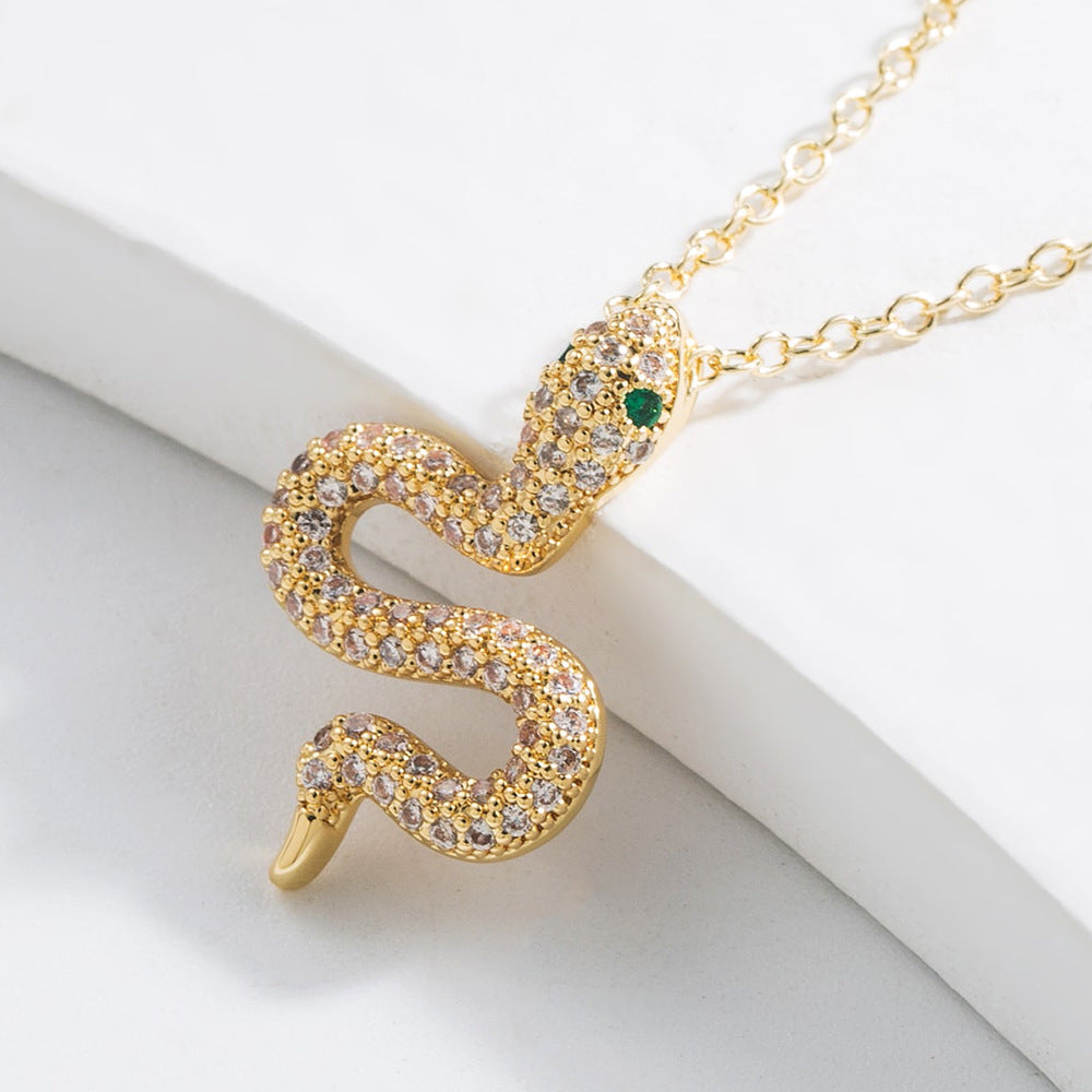 Minimalist Geometric Snake Pendant Necklace for Women in Copper with 18K Gold Plating and Micro-Paved Zirconia
