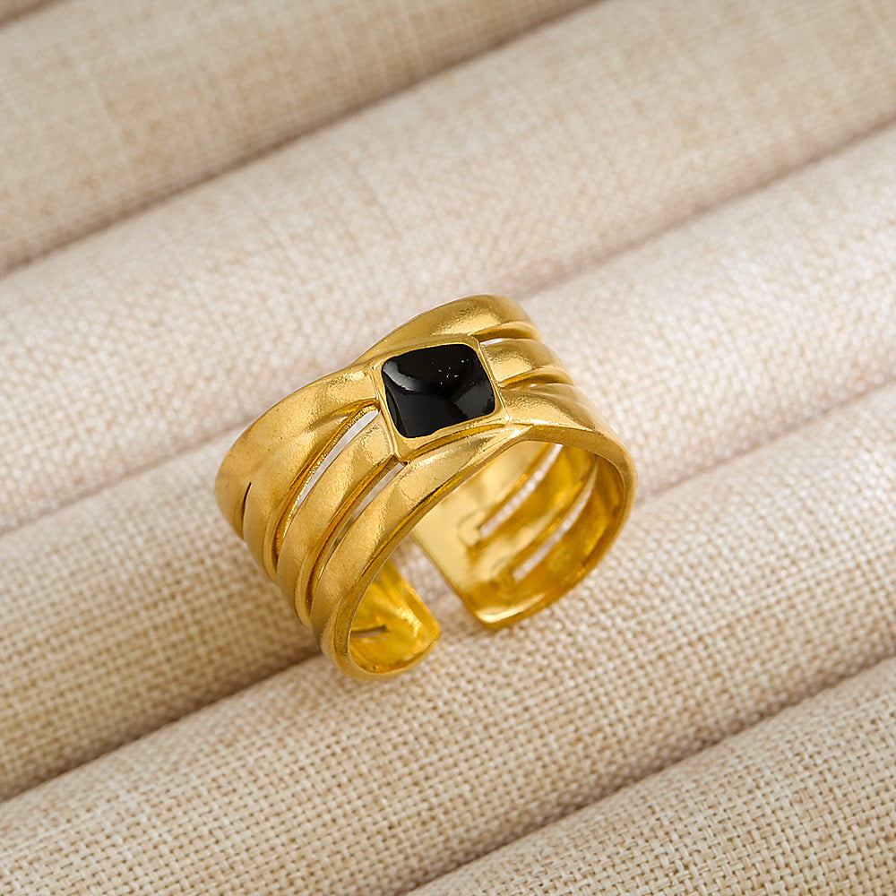 Anillo de acero de titanio con forma de U, estilo punk, chapado en oro de 18 quilates y detalles de microincrustaciones de piedra de lava ovalada