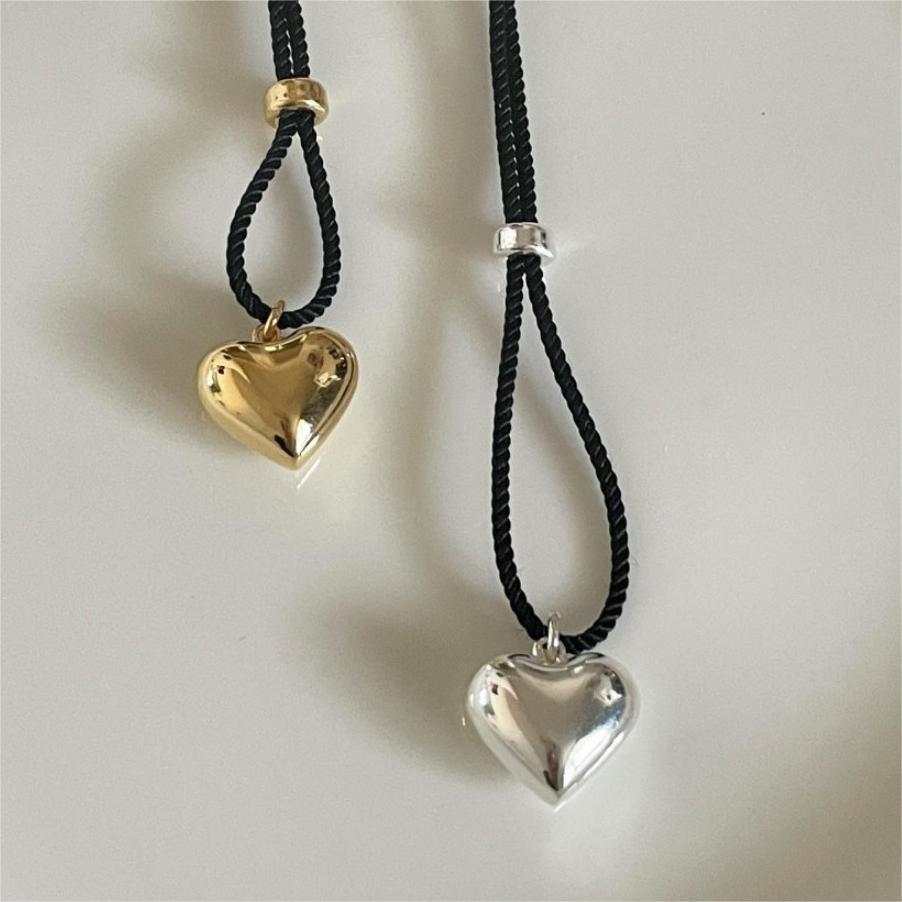 Minimalist Heart-Shaped 925 Sterling Silver Necklace with Gold Plating on Waxed Cotton Cord