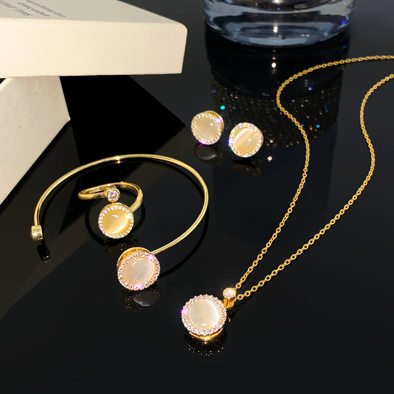 Minimalist Luxury Round Micro-Paved Cubic Zirconia Rotating Cat's Eye Moonstone Titanium Steel Necklace for Women