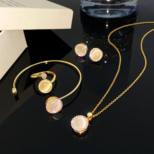 Minimalist Luxury Round Micro-Paved Cubic Zirconia Rotating Cat's Eye Moonstone Titanium Steel Necklace for Women