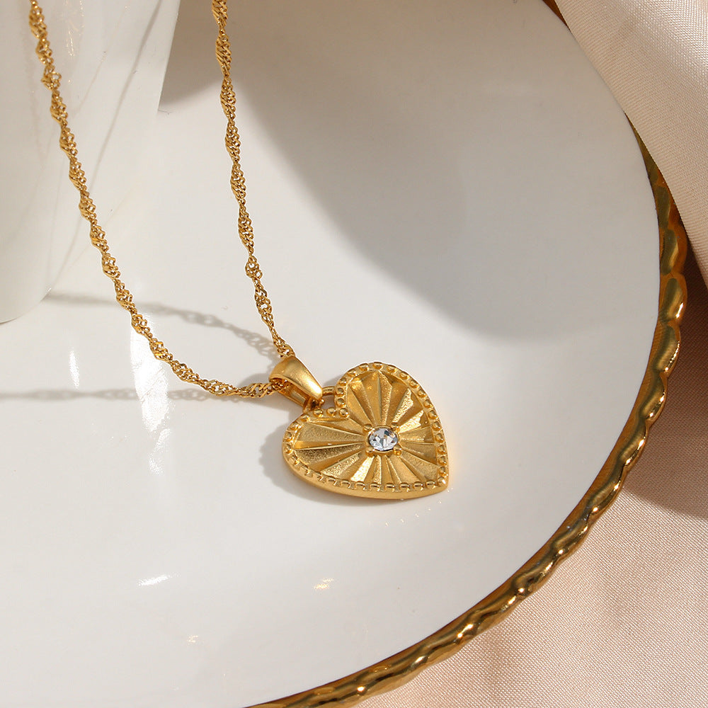 Fashionable Heart-Shaped Zircon-Set Stainless Steel Pendant Necklace with 18K Gold Plating and Leaf Texture for Women