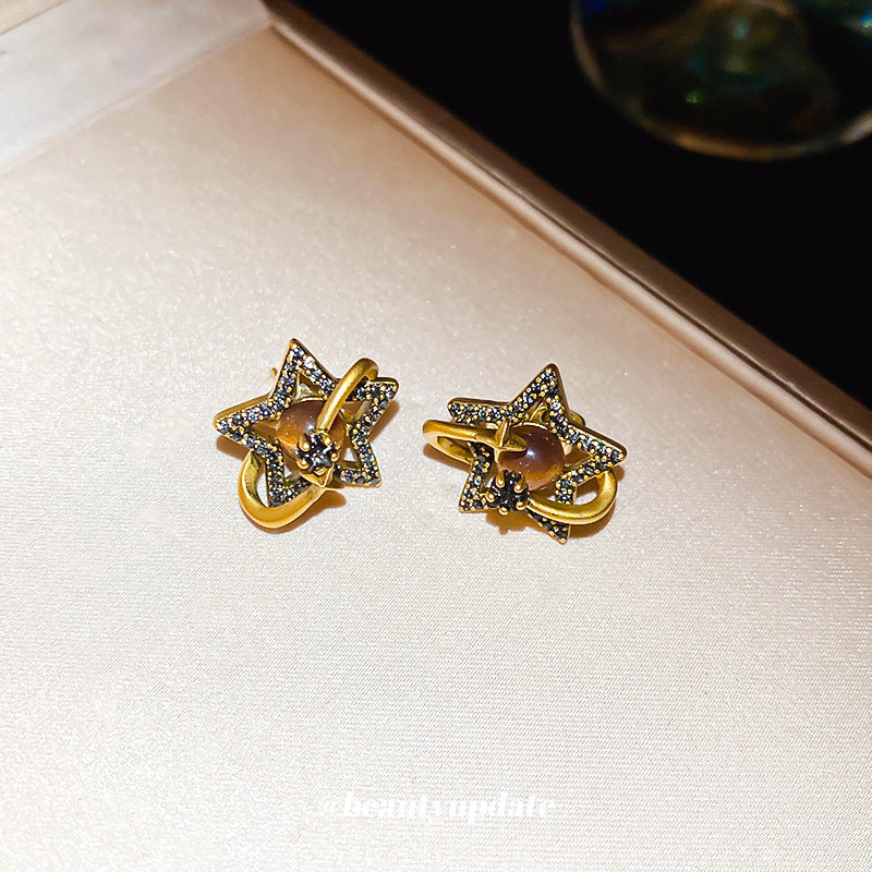 Pendientes de botón con diseño geométrico en forma de Saturno chapados en oro de estilo lujoso para mujer con incrustaciones de circonita y diseño minimalista elegante