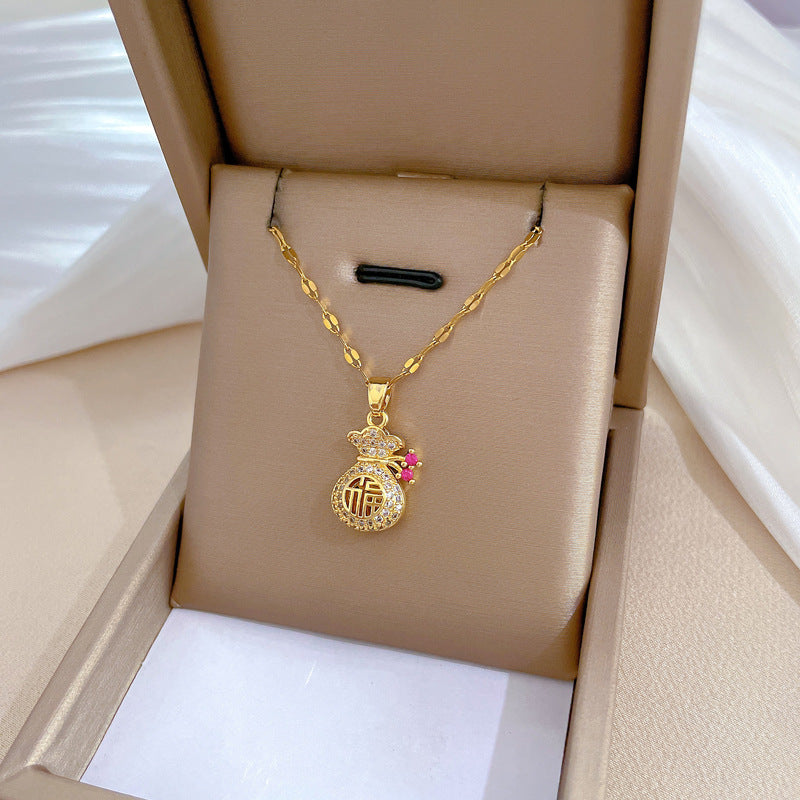 Collana con ciondolo a catena per labbra in acciaio al titanio con intarsio di strass e motivo del carattere cinese "Fu", stile dolce e fresco geometrico
