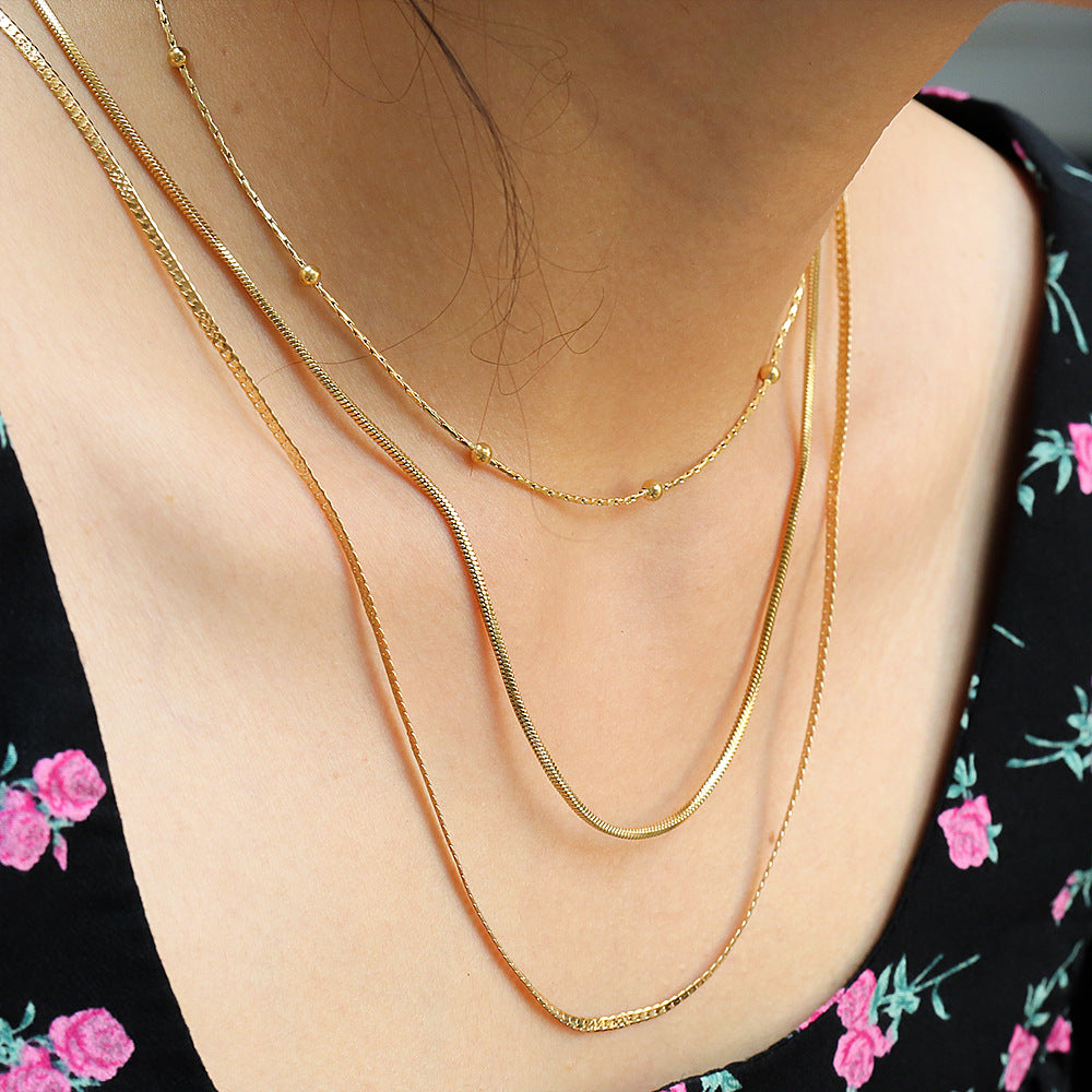 Collana da donna a triplo strato con catena snake in acciaio inossidabile geometrica e minimalista, placcata in acciaio al titanio