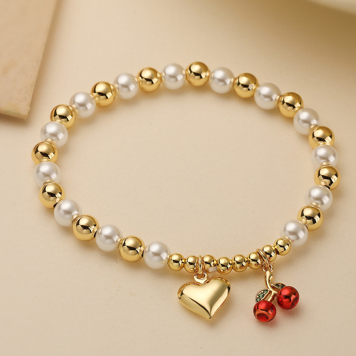 Fashion-Commuter Cherry and Heart-Shaped Pearl Beaded Bracelet for Women with Gold Plating on Copper