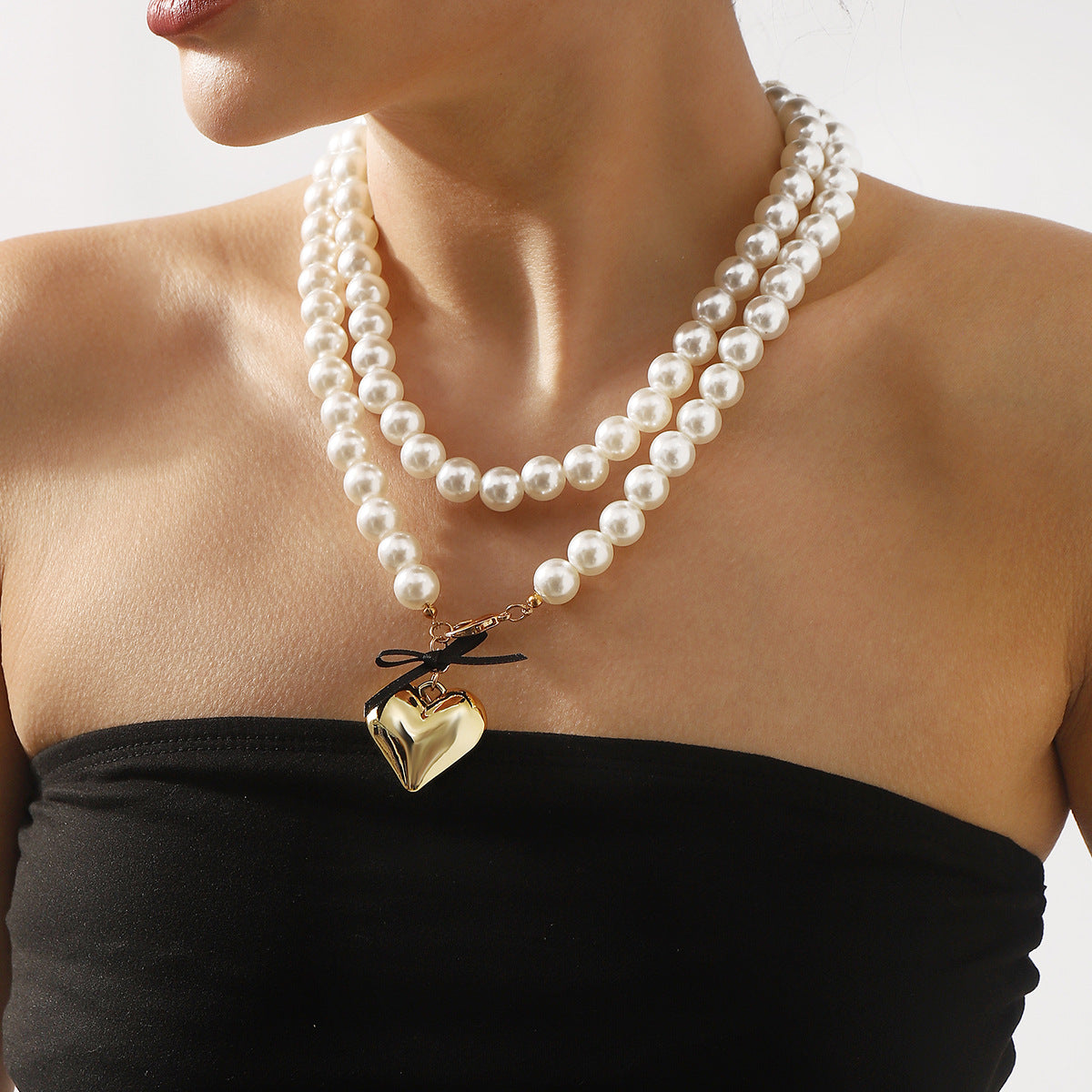 Dolce Collana con Fiocco a Nastro Minimalista a Cuore con Perla da Donna con Finitura Placcata e Delicata Catena per Clavicola
