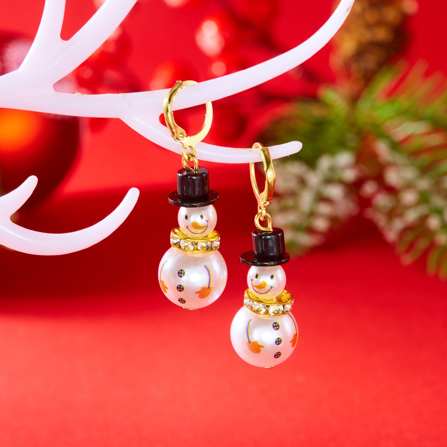 Pendientes de perlas con forma de copo de nieve estilo navideño con detalles de diamantes de imitación en aleación con acabado chapado para mujer