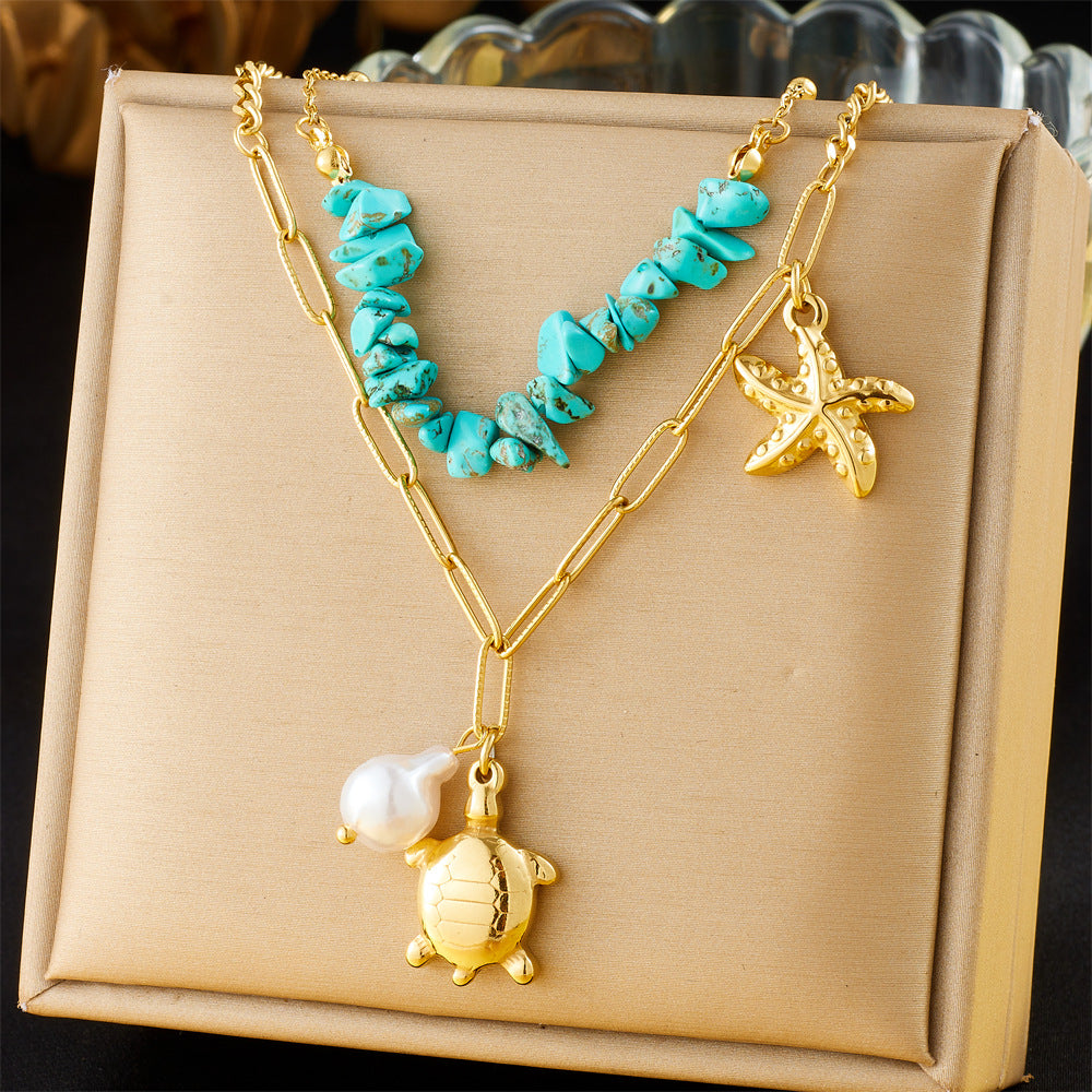 Collana con ciondolo personalizzato a forma di tartaruga e stella marina in acciaio inossidabile con strass blu su catena a maglie per donna