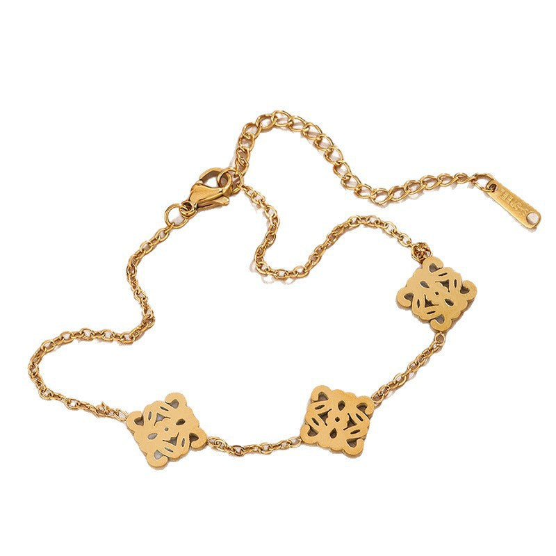 Set Collana e Bracciale in Acciaio Inossidabile con Tagli Geometrici Vuoti di Lusso Placcato Oro 18K