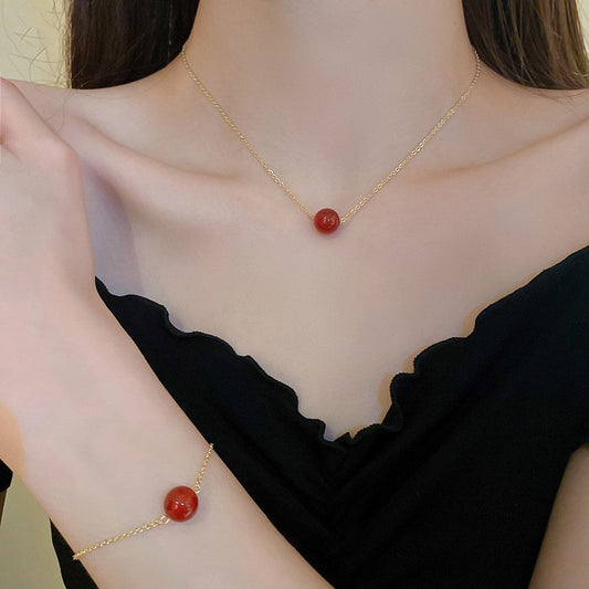 Pulsera minimalista de cuentas rojas para mujer y hombre en acero de titanio con acabado chapado