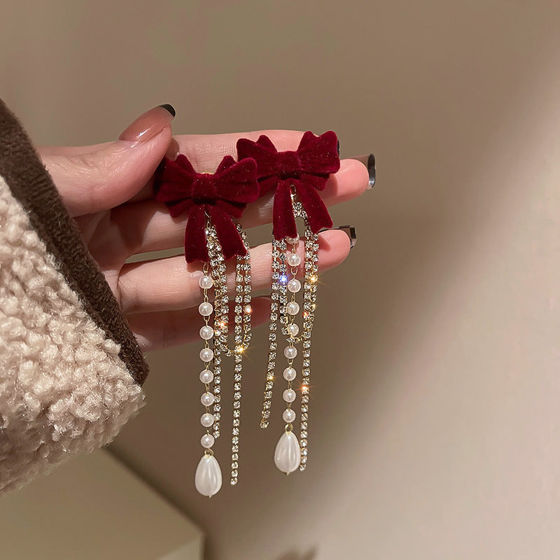 Orecchini di lusso a fiocco con cuore e motivo floreale in lega con intarsio di strass e perni in argento 925