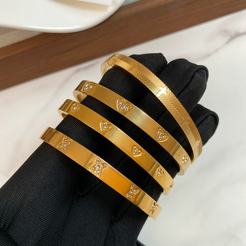Micro-Inlaid Cubic Zirconia Oval Geometric Titanium Steel Plated Bracelet for Women