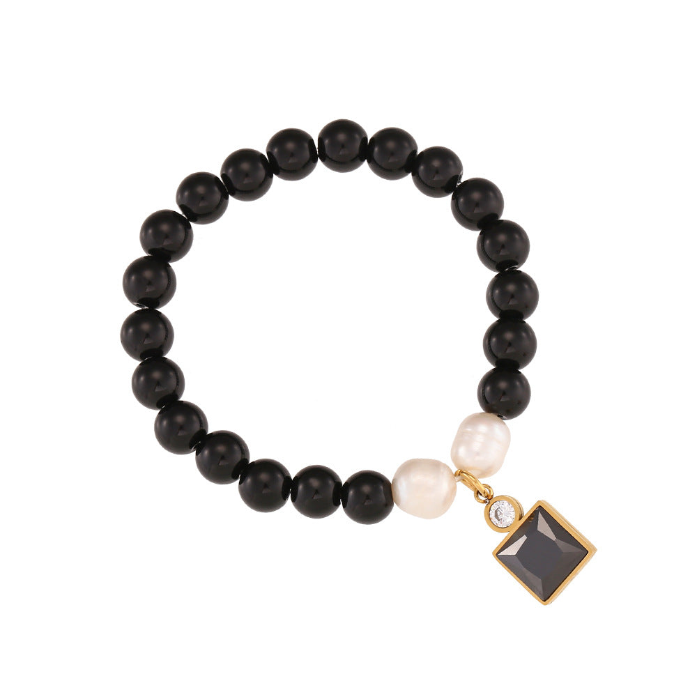 Pulsera de Cuentas de Piedra Natural Ónix Negro Geométrica Minimalista con Acentos de Zirconia y Baño de Rodio para Mujer