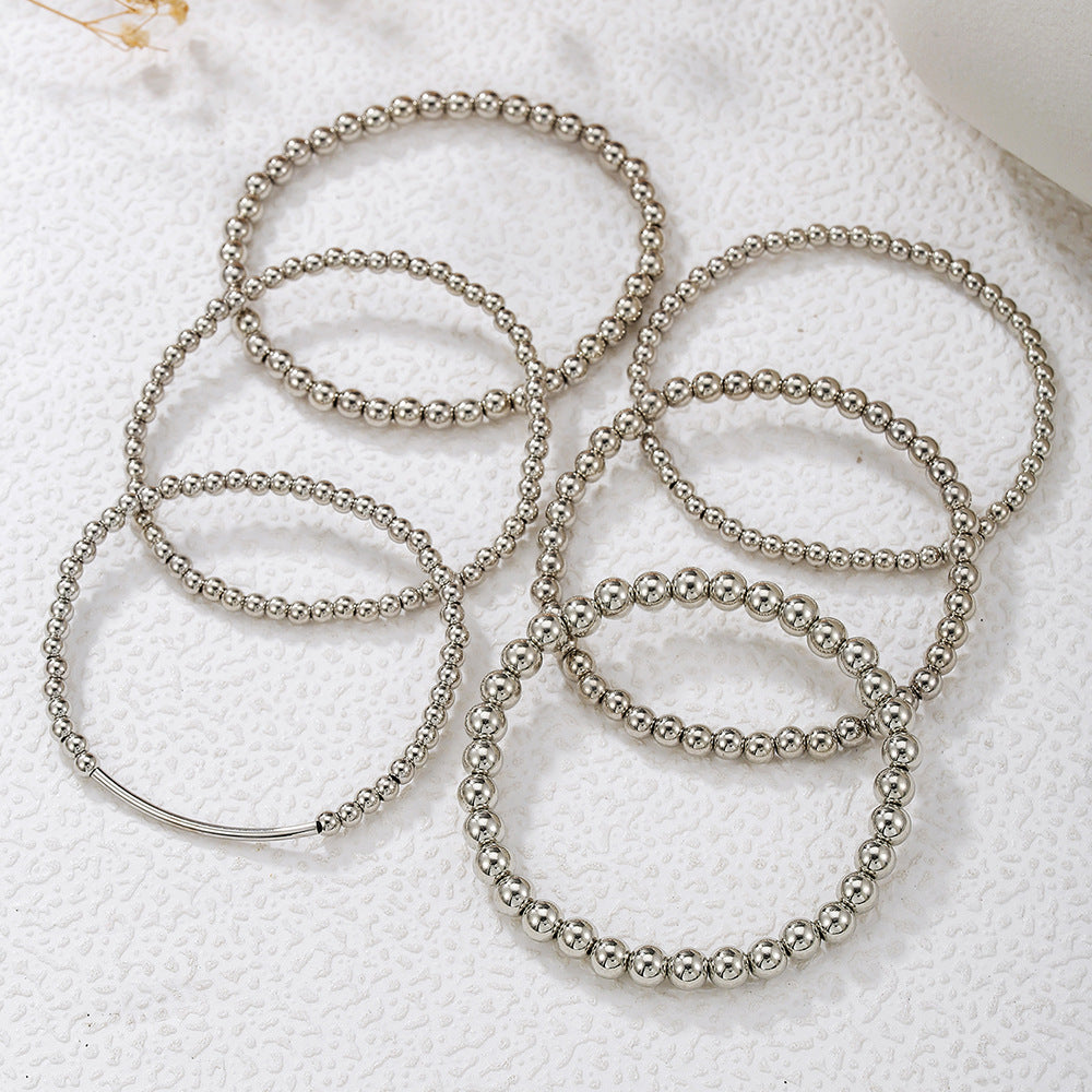 Set di Bracciali Artigianali da Donna in Metallo con Perline, Stile Geometrico e Dettagli Circolari