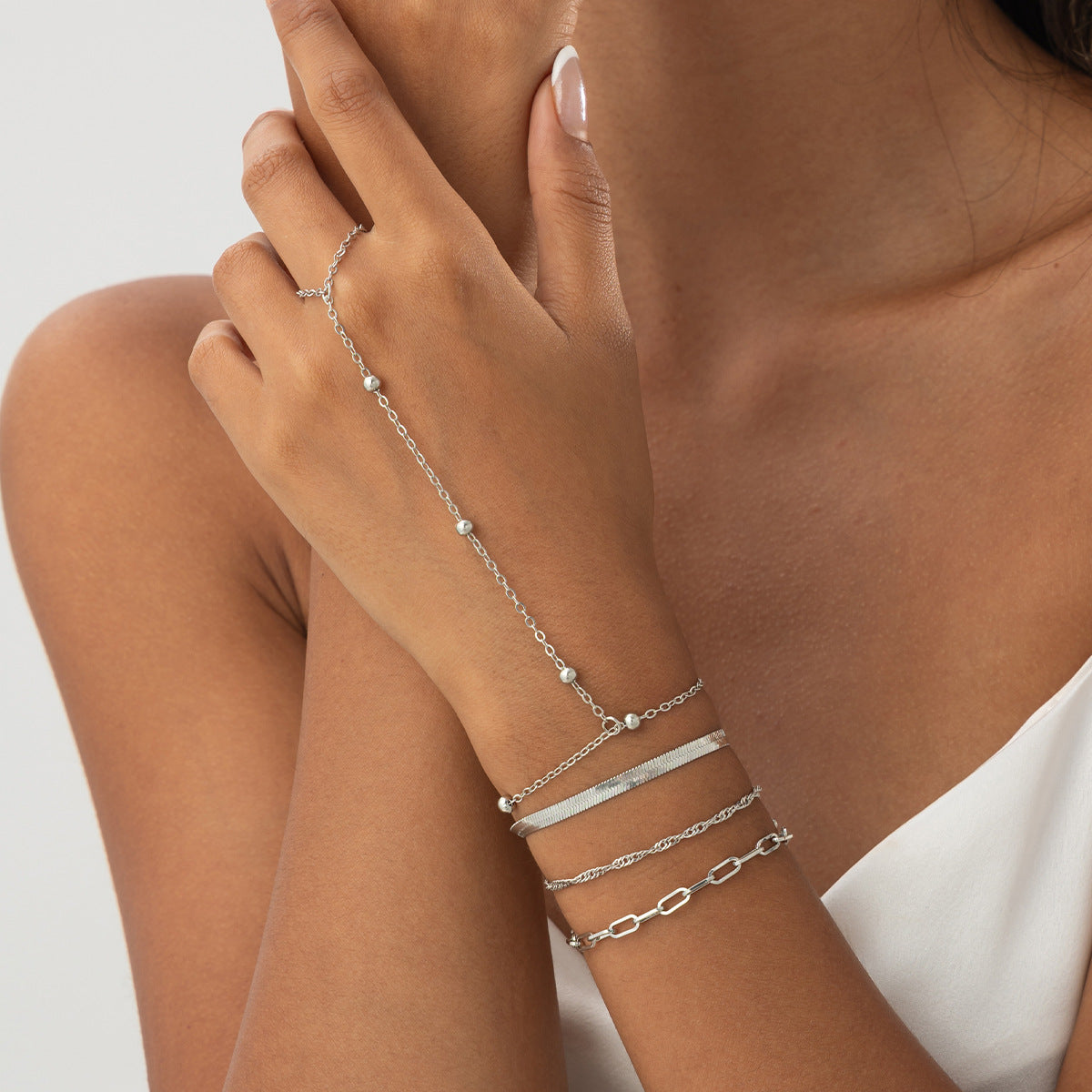 Minimalist Cold-Tone Geometric Metal Snake Chain Bracelet for Women with Micro-Pave Detailing and Layered Styling