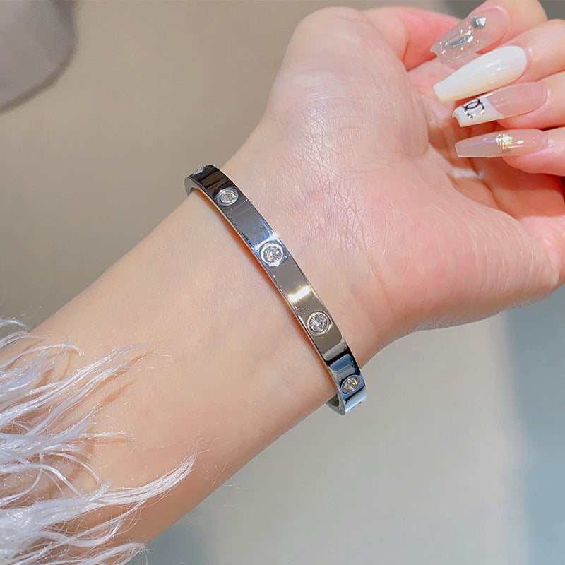 Minimalist Elliptical Titanium Steel Bracelet with Plating Finish for Women Elegant Lightweight Luxury Bangle